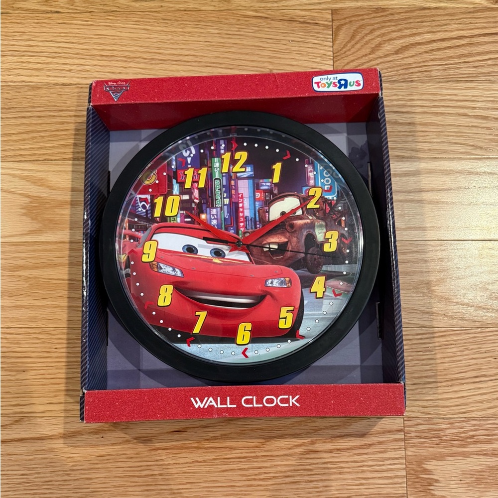 Disney Pixar Cars 10'' wall clock featuring Lightning McQueen by Toys"R"Us. NIB